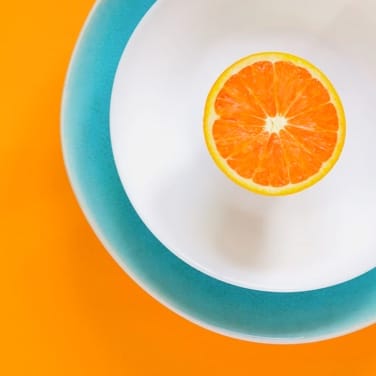 Image of an sliced orange on a plate